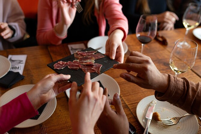 Barcelona Tapas Food Tour with Lunch or Dinner in El Born - Stop-by-stop: five dishes across four restaurants