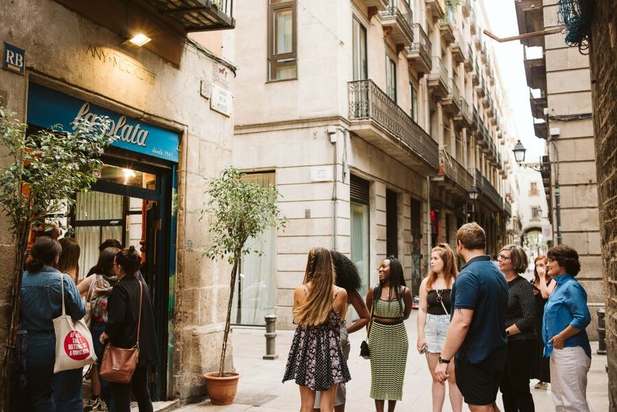 Barcelona: Tapas, Wine & History Tour of the Old Town - Stop 1: a community-rooted tapas bar with Catalan aperitifs