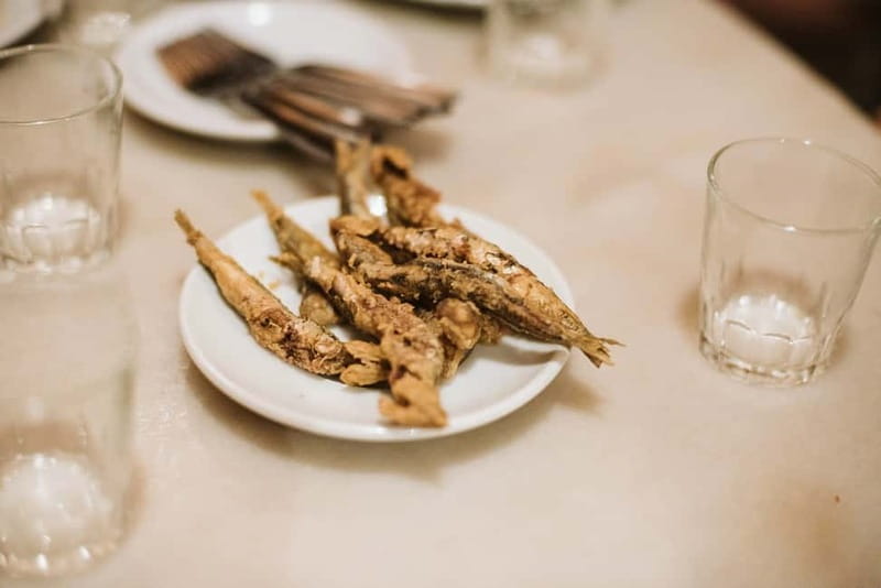 Barcelona: Tapas, Wine & History Tour of the Old Town - Stop 3: the sit-down finale with shared plates and red wine