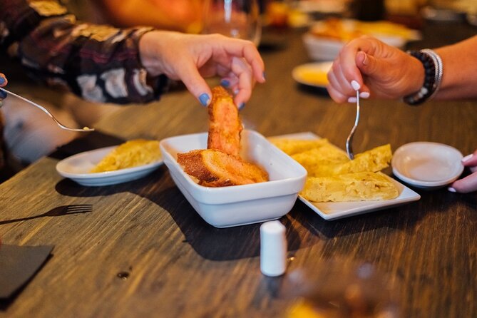 Barcelona Tapas & Wine Walking Tour with Optional Flamenco - What you actually taste: Iberian ham, padron peppers, and wine pairings