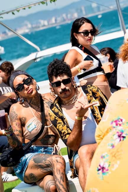 Barcelona: The Original Barcelona Boat Party - Music and Crowd Energy: DJ Beats, International Mix, and Social Momentum