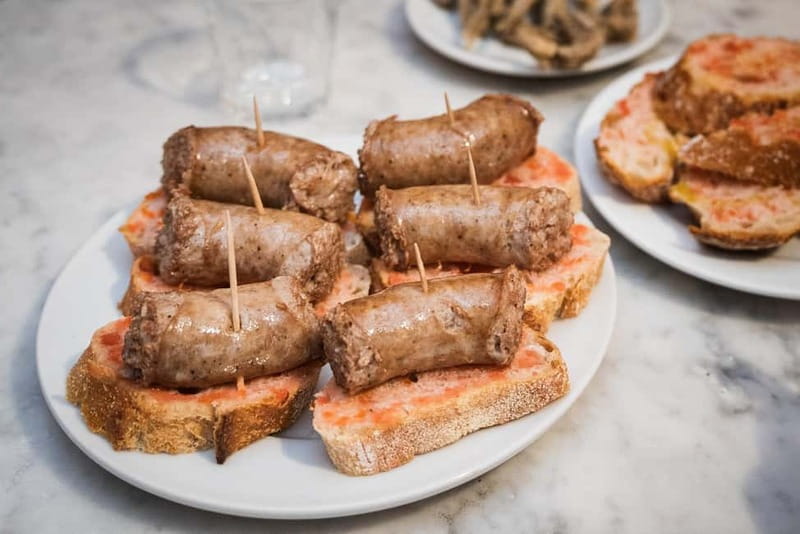 Barcelona: The Ultimate Local Tapas & Drinks Food Tour - Start at Plaça de l’Angel, then work your way toward Jaume I