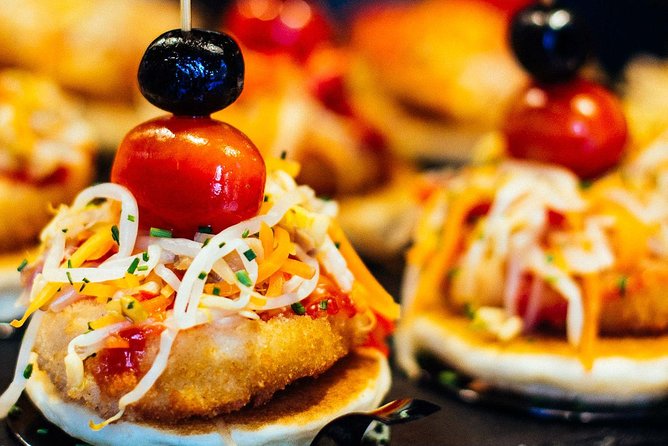 Barcelona With Locals: Wine and Tapas Private Tour - Mercat de Sant Antoni: the market stop that sets up your palate