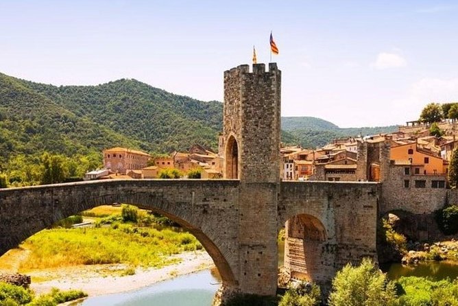 Besalu & 3 Medieval Towns Small Group Tour with Hotel Pick-Up - Drive-By Sights: Catalunya Square and Gaudí on Passeig de Gràcia