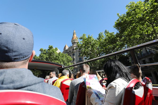 City Sightseeing Barcelona Hop-On Hop-Off Bus Tour: 24 or 48-Hour - Small issues to watch: rain, traffic, staff hiccups, and earphone fit