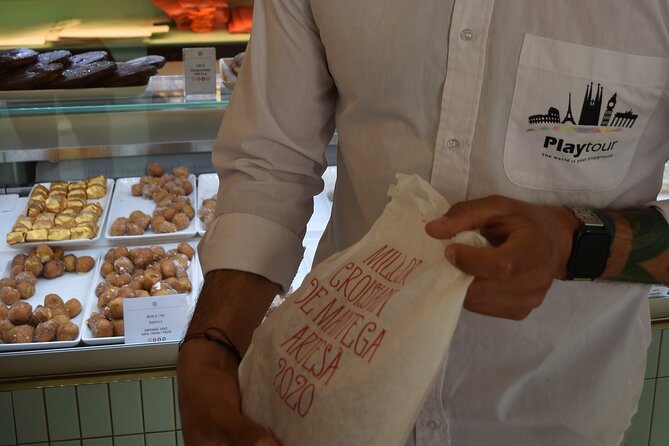 Cultural Walking Tour in Barcelona with Food & Wine Tasting - Mercat de la Boqueria: acorn-fed ham and paella in one market moment