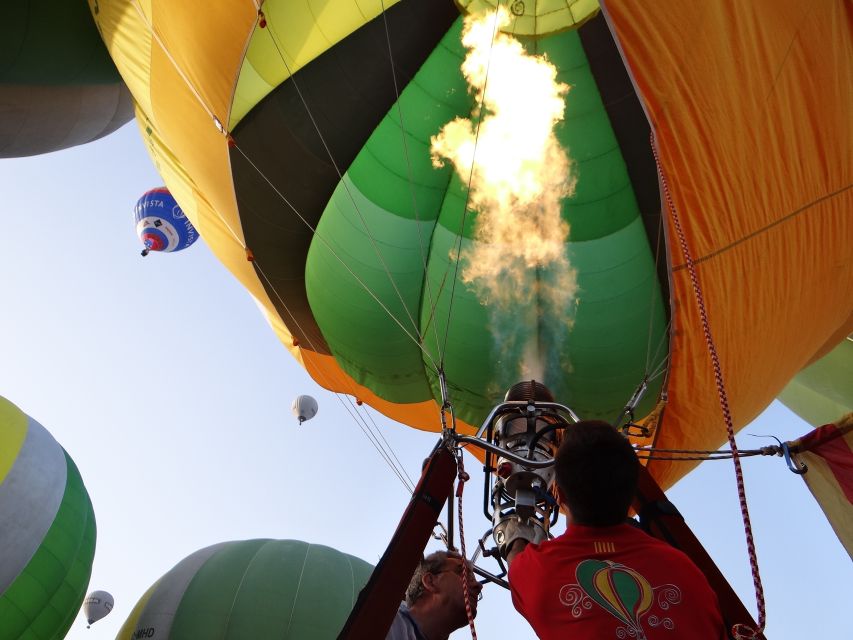 European Balloon Festival: Hot Air Balloon Ride - The festival atmosphere around you, including Night Glow later