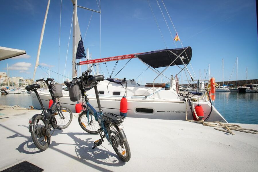 From Barcelona: E-Bike and Sailing Tour with Wine Tastings - Onboard snacks, swim breaks, and the real mood of the day