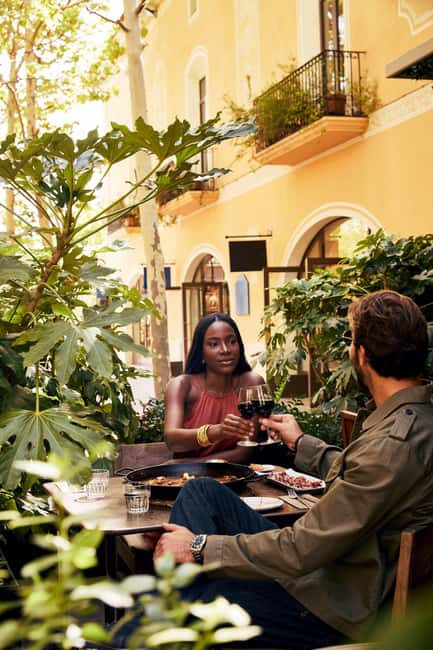 From Barcelona: La Roca Village Shopping Express® Day Trip - Inside La Roca Village: VIP Pass, bag carry, and how savings really play out