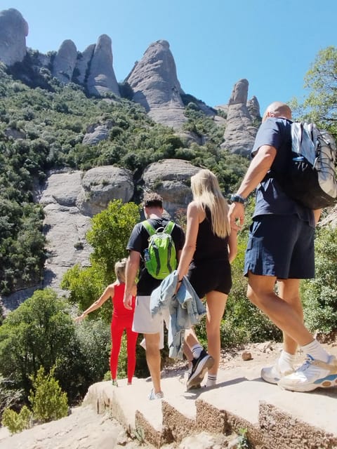 From Barcelona: Montserrat Monastery & Hike with Cable Car - Inside Montserrat Monastery: legends, Catalan identity, and skip-the-line entry
