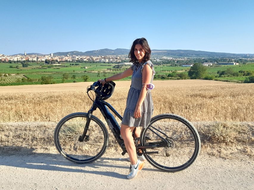 From Barcelona: Penedès E-Bike Tour with 2 Winery Visits - Winery stop two: cellar tour, 4 more samples, and local snacks