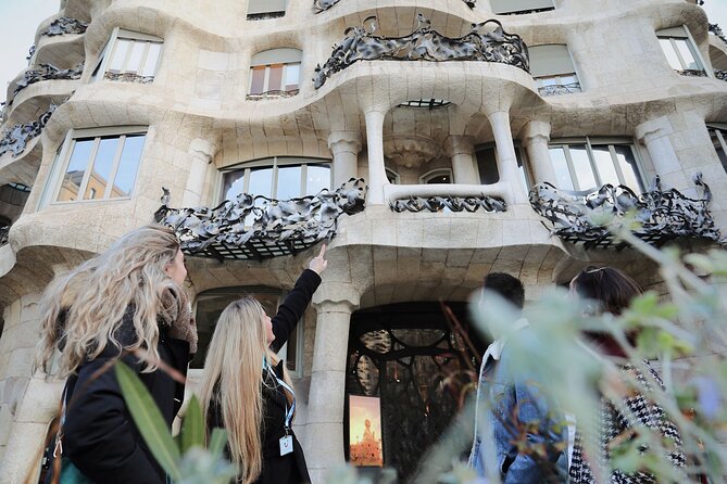 Guided private morning tour of La Pedrera with Casa Batlló ticket - The rooftop terrace and the rain rule you should plan around