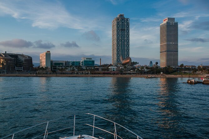 Guided Private Yacht Tour in Barcelona Spain - Swim breaks and stand-up paddle boarding, when conditions allow