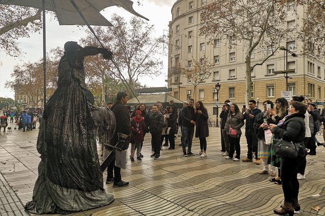 Kickstart Barcelona Private Tour. City Highlights for newcomers - Plaça Reial and Gaudí-style streetlamps: a square that feels like a scene