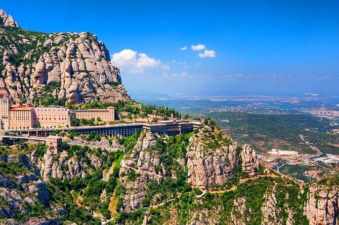 Montserrat Day Trip from Barcelona with Cogwheel Train - Montserrat by train, with monastery access built in