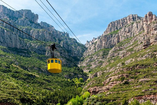 Montserrat Guided Tour with Cogwheel or Cable Car & Black Madonna - Montserrat First Impressions: Views, Jagged Rock, and a Name You’ll Remember