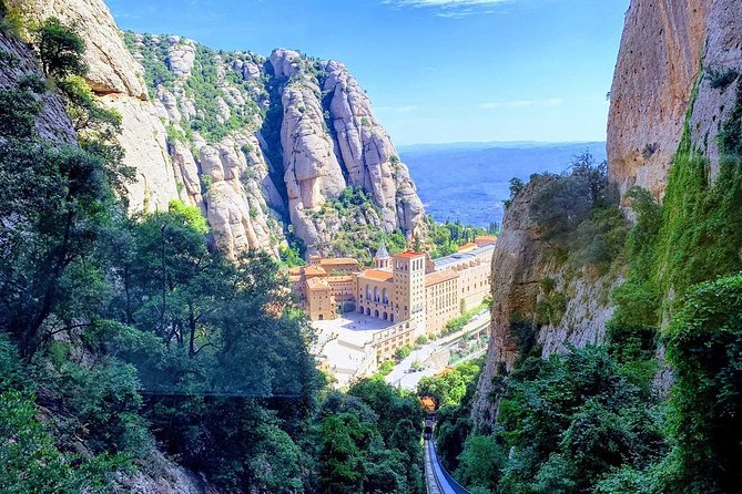 Montserrat Private Tour by Train from Barcelona - Basílica de Montserrat: La Moreneta and monastery life