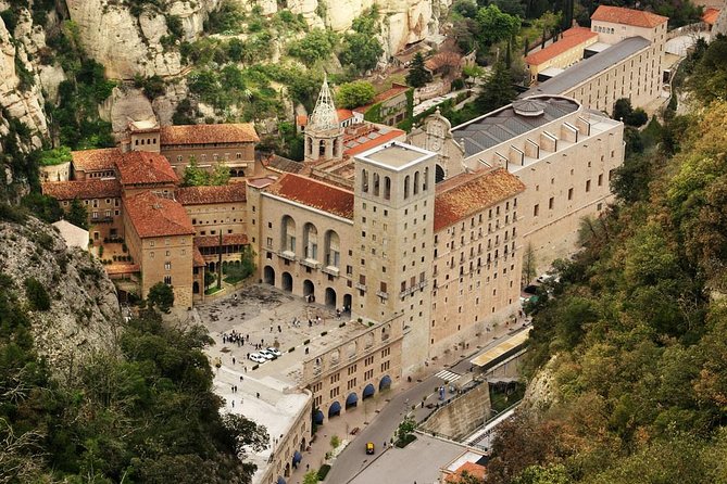 Montserrat Private Tour w/ Official Guide + Hotel or Port pick up - Santa María de Montserrat inside: the church experience and the Black Madonna moment