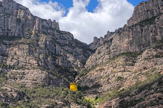 Montserrat Tour by Train with Cable Car and Cogwheel - Monistrol to the top by Cremallera cogwheel train