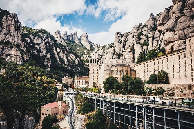 Montserrat with Cog-Wheel Train & Black Madonna Priority Access - The cogwheel train ride on Cremallera de Montserrat is the best warm-up