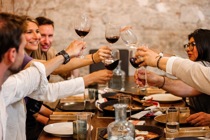 Paella Experience and Bottomless Wine in Barcelona - Paella Club Meets You in Ciutat Vella at 8:00 pm