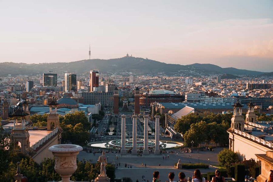 Panoramic Barcelona: Montjuïc, Cable Car, and Beach - Playa de Sant Sebastià walk: trading hills for Mediterranean air