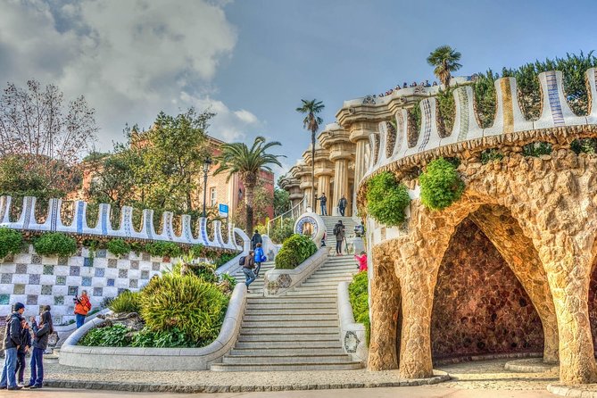 Park Guell and Sagrada Familia Private Tour with Hotel pick-up - Montjuïc first: panoramic views, modern art sites, and city-defense history