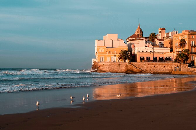 Photo Walking Tour Sitges Experience Beaches and Town - The full route: Hotel Noucentista, statues, church angles, and Sant Sebastia Beach