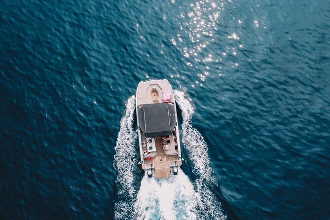 Private Charter in Catamaran Alexa by Barcelona 12 pax 2/4/8 HS - Onboard Comfort: Restroom, Snacks, Water, Soda, and Drinks