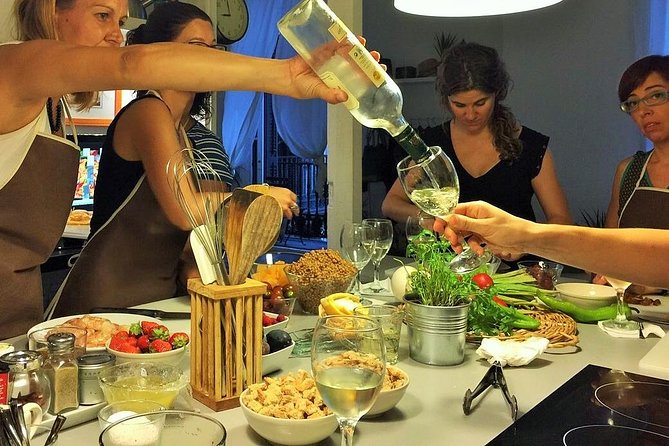 Private Paella class, Tapas, full menu and Sangria workshop - Cooking seafood paella with hands-on roles