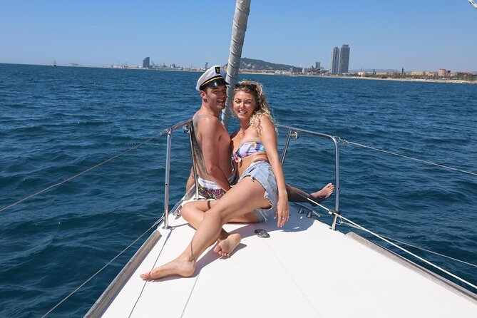 Private Skipper Sailing Tour for up to 11 people - Sailing south from Port Olímpic, beaches and skyline close up