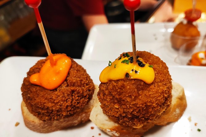 Spanish Wine and Tapas Tour in a Local Neighborhood in Barcelona - Stop-by-stop: what happens at each bar in El Poble Sec