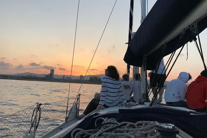 Sunset at PREMIUM Boat in Barcelona - Winter Blankets and Summer Paddle Surfing