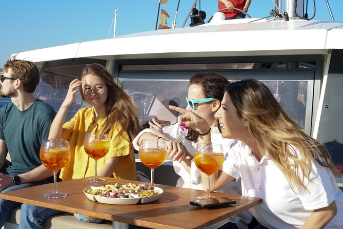Sunset Catamaran: Small Group, Drinks, Snacks & Dinner Upgrade - From Moll de Mestral to the Coastline, What the Sailing Feels Like