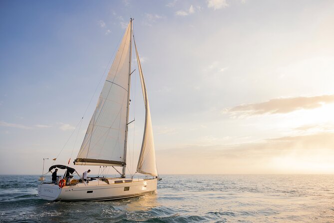 Sunset On A Luxury Sailboat From Port Olimpic - What you will actually see: Port Vell to Montjuïc to the far skyline