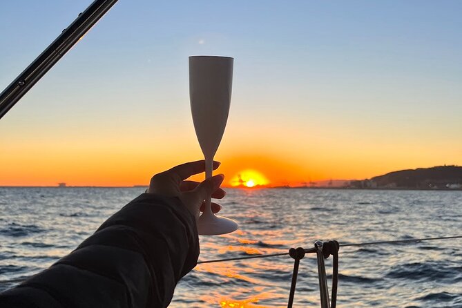 Sunset Sailboat Tour along the Coast with Open Bar - Group vibe on a max 11-person sail: relaxed, not staged