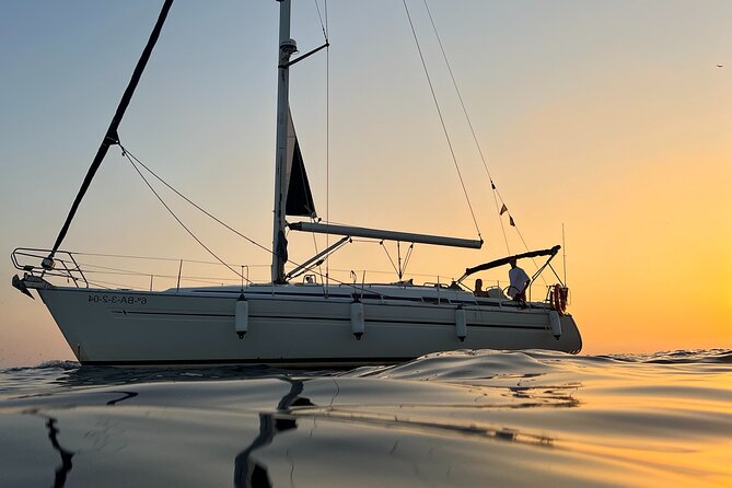 Sunset Sailing Cruise in Barcelona led by Young & Local Captain - The Sunset Toast: Local Wine, Cava, Beer, Snacks, and a Polaroid