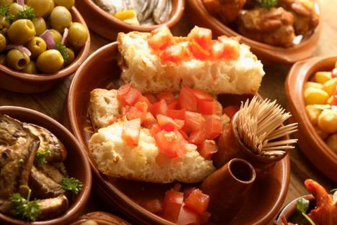 Tapas and Flamenco Show Small Group Tour in Barcelona - Tapas tasting stops that actually feel like Barcelona
