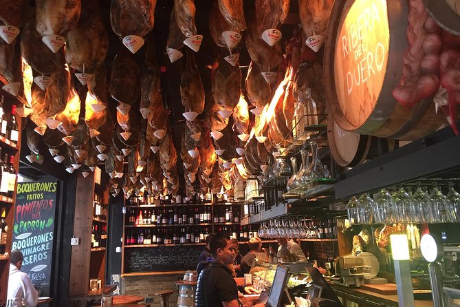 Taste of Barcelona: Boqueria Market, Tapas & History Tour - Final Catalan Tavern Finish: Wine, Porron, and the Last Bites