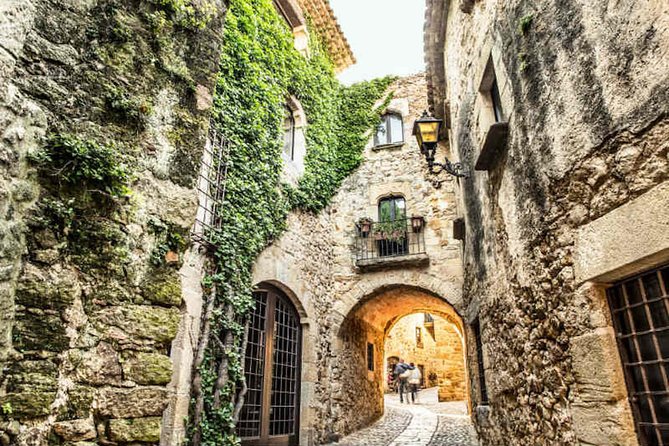 Three Medieval Gems & Local Lunch Private Tour from Barcelona - Besalú Romanesque bridge, mikveh, and the town’s medieval layers